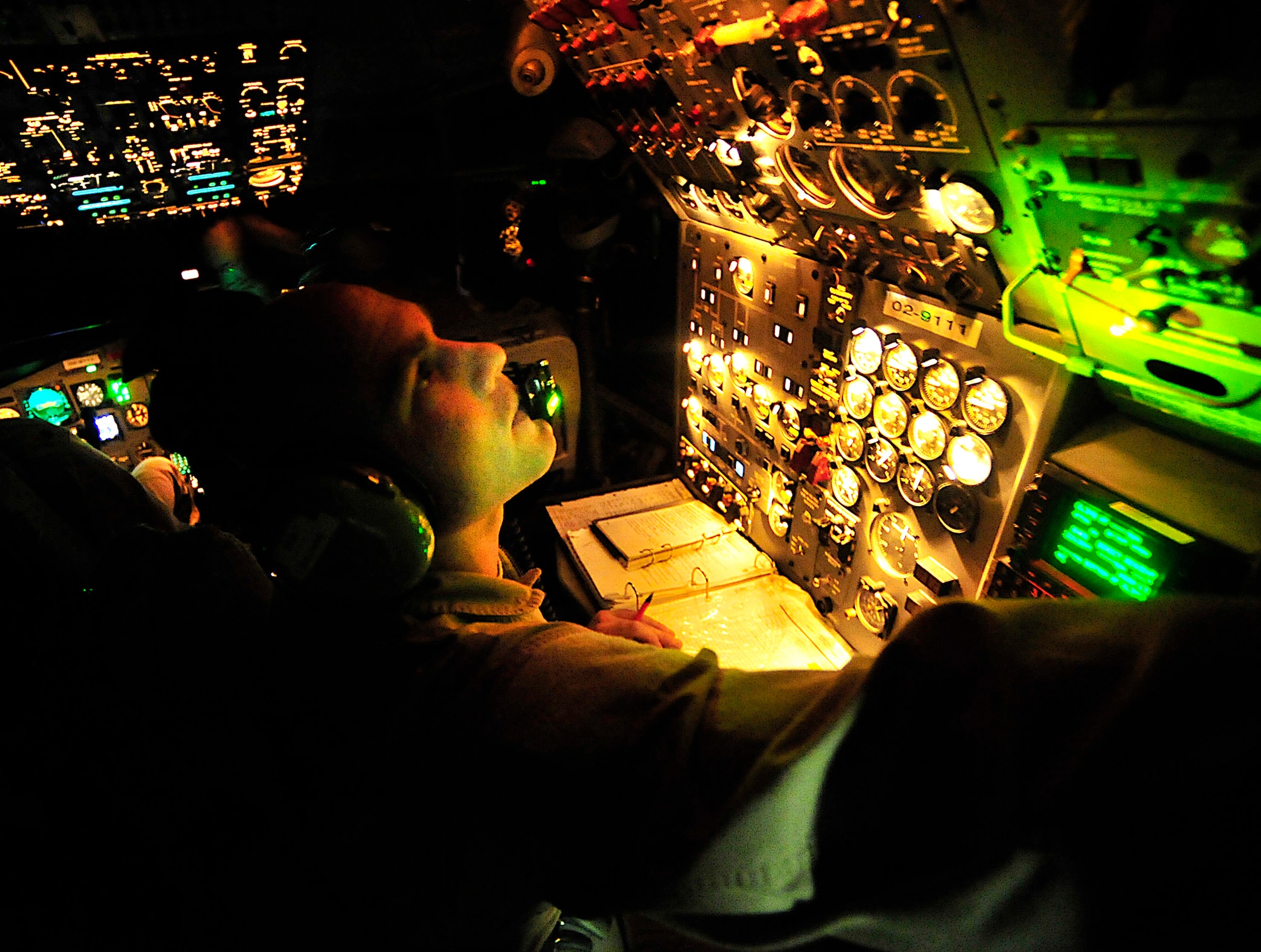 Flight engineer Tech. Sgt. Bo Sullivan, 7th Expeditionary Air Combat and Control Squadron Joint Surveillance Target Attack Radar System crew member, prepares to take off on a mission over Iraq. The E-8C JSTARS is an airborne battle management, command and control, intelligence, and reconnaissance platform that is currently undergoing a recapitalization. The Hanscom AFB-based program received a Milestone A decision Dec. 10, 2015 and is currently in the Technology Maturation and Risk Reduction phase.. (U.S. Air Force photo by Staff Sgt. Aaron Allmon)