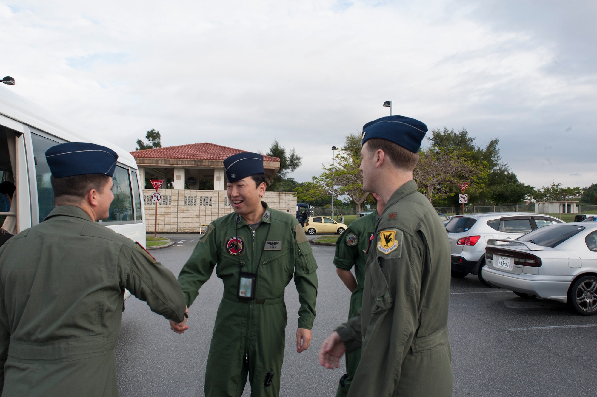 U.S. Air Force Lt. Col. Jonathan Burdick, 909th Air Refueling Squadron commander, greets Japan Air Self Defense Force Lt. Col. Takahiro Seki, 404th ARS commander, Jan. 22, 2016, at Kadena Air Base, Japan. JASDF’s 404th ARS visited Kadena’s 909th ARS to have their first commander to commander and unit to unit meeting. This meeting allowed both teams to discuss their operations and form bilateral friendships. (U.S. Air Force photo by Airman 1st Class Lynette M. Rolen)