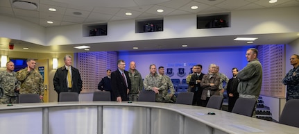 U.S. Navy Adm. Cecil D. Haney (right), U.S. Strategic Command commander, and senior Department of Defense (DoD) leaders, including Gen. David L. Goldfein (center), U.S. Air Force vice chief of staff, and Ms. Stephanie O'Sullivan (fourth from right), Principal Deputy Director of National Intelligence, attend the Joint Interagency Combined Space Operations Centerâ€™s (JICSpOC) distinguished visitor day at Schriever Air Force Base, Colo., Jan. 26, 2016. The JICSpOC became operational in October 2015 through the partnership and collaborative efforts of USSTRATCOM, the National Reconnaissance Office, Air Force Space Command, the Air Force Research Laboratory, the intelligence community and commercial data providers who recognized the need to leverage existing Joint Space Operations Center (JSpOC) mission systems upgrades and include additional systems and capabilities from their respective organizations. These capabilities enable a more integrated unity of effort between the DoD and intelligence community as they confront the challenges of operating in the contested, congested and competitive space environment. Haney and other senior leaders attended the event to observe the JICSpOCâ€™s capabilities, to receive an update on the experimentation conducted to date during the first phase of its operations and to discuss space-related issues. One of nine DoD unified combatant commands, USSTRATCOM has global strategic missions, assigned through the Unified Command Plan, which include strategic deterrence; space operations; cyberspace operations; joint electronic warfare; global strike; missile defense; intelligence, surveillance and reconnaissance; combating weapons of mass destruction; and analysis and targeting. (U.S. Air Force photo by Christopher DeWitt)