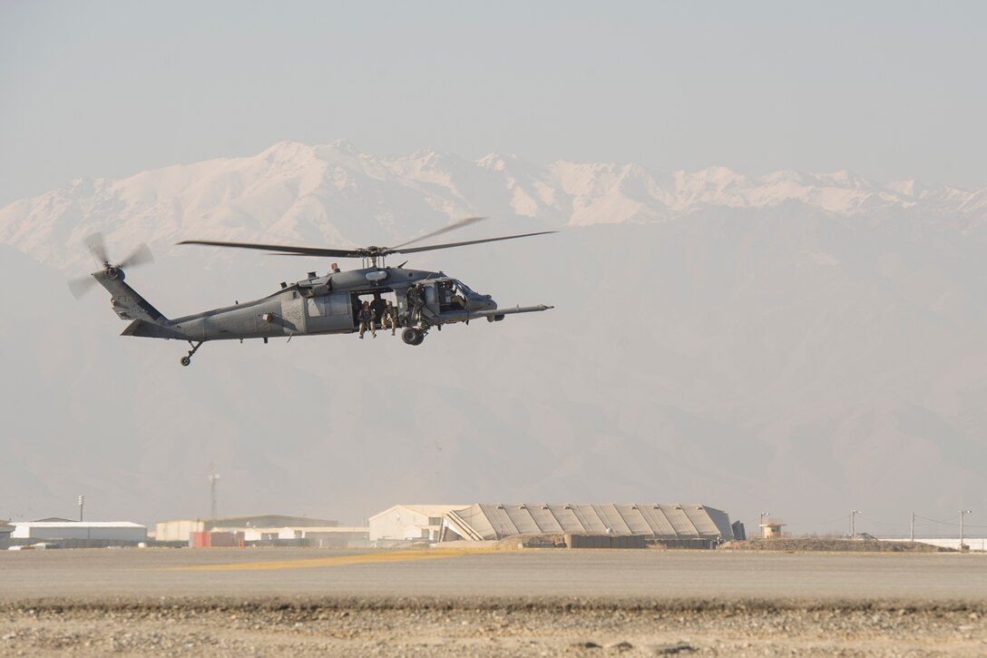 Air Force pararescuemen flying in an HH-60G Pave Hawk helicopter approach a landing zone during an extrication exercise on Bagram Airfield, Afghanistan, Jan. 23, 2016. Air Force photo by Tech. Sgt. Robert Cloys