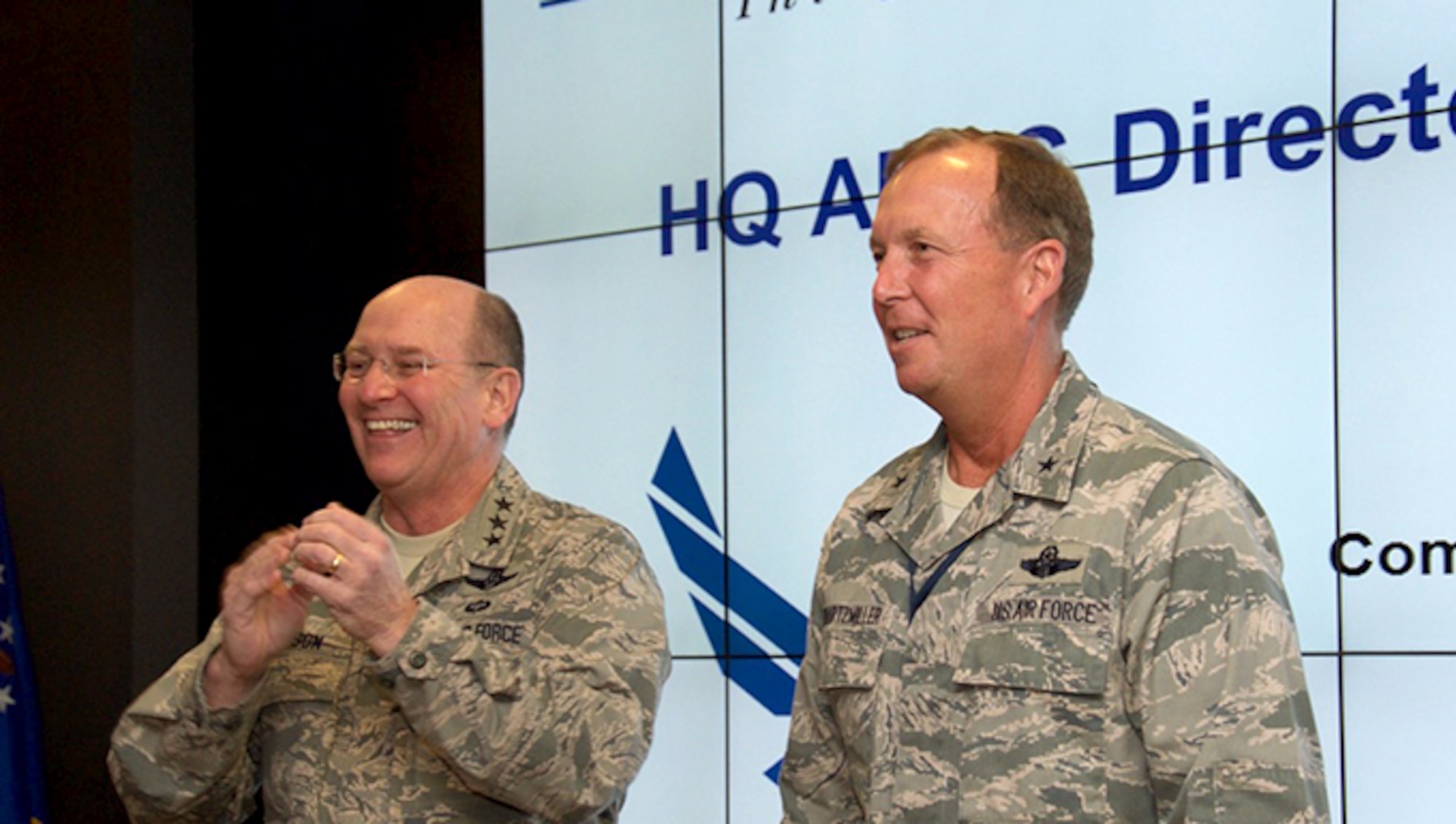 Brig. Gen. Allan Swartzmiller, Air Force Reserve Command Inspector General, Robins Air Force Base, Ga., is introduced by Lt. Gen. James Jackson, Chief of Air Force Reserve, Headquarters U.S. Air Force, Washington, D.C., and Commander, Air Force Reserve Command, prior to being sworn in during a directors meeting Jan. 19. Swartzmiller is responsible for advising the command's leadership on how to optimize resources and enhance mission