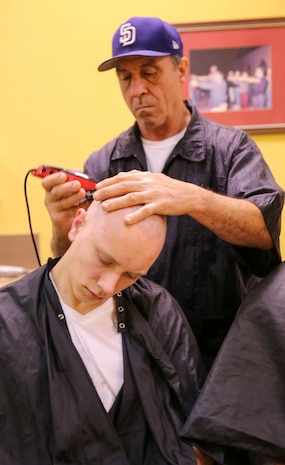 A new recruit of Alpha Company, 1st Recruit Training Battalion, receives his first haircut during receiving at Marine Corps Recruit Depot San Diego, Jan. 25. Recruits receive haircuts immediately after arriving to create uniformity. Annually, more than 17,000 males recruited from the Western Recruiting Region are trained at MCRD San Diego. Alpha Company is scheduled to graduate April 22.