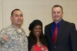 Dr. Karen Johnson, associate professor of education at the University of Utah, poses for a group photo with equal opportunity advisers Sgt. 1st Class William Yazzie and Greg Rogers during a Black History Month observance held at Fort Douglas, Utah, Feb. 25. The purpose of the event was to spread cultural awareness and provide a history lesson on the role of the African-American female during the Civil War. (U.S. Army photo by Capt. Chad M. Nixon)