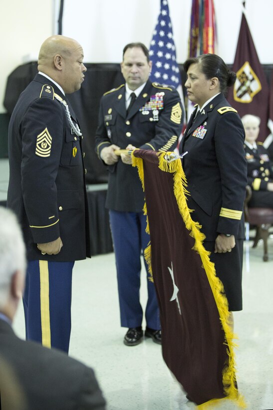 U.S. Army Reserve Brig. Gen. Tracy L. Smith, right, is the newest medical service corps (MSC) brigadier general and the first Guamanian female general officer in the Armed Forces. The promotion ceremony was held at the C.W. Bill Young Armed Forces Reserve Center in Pinellas Park, Fla., Jan. 24, 2016. Smith graduated from the University of Guam and earned a master’s degree from Troy University in Alabama as well as the Army War College. She served in Hawaii, Georgia, New York and Washington; has received numerous awards and badges for service and medical merit. (U.S. Army photo by Spc. Tracy McKithern/Released)