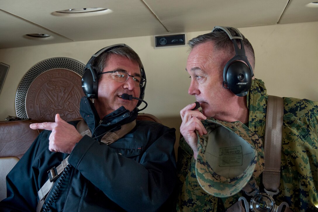 Defense Secretary Ash Carter and Marine Corps Gen. Joseph F. Dunford Jr., chairman of the Joint Chiefs of Staff, talk on helicopter headsets on their way back to the Pentagon after a visit to U.S. Cyber Command headquarters on Fort George G. Meade, Md., Jan. 27, 2016. DoD photo by Air Force Senior Master Sgt. Adrian Cadiz