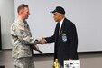 Brig. Gen. Frederick R. Maiocco, Jr., left, commanding general, 85th Support Command and deputy commanding general, First Army Division West; meets Oscar Lawton “Wilk” Wilkerson, local Chicagoan and Tuskegee Airman, during an African American/Black History Month unit observance, at the 85th Support Command’s headquarters, Feb. 7. During the observance, Wilkerson discussed his experiences in the service and held a questions and answers portion with the soldiers there. (U.S. Army photo by Spc. David Lietz/Released)