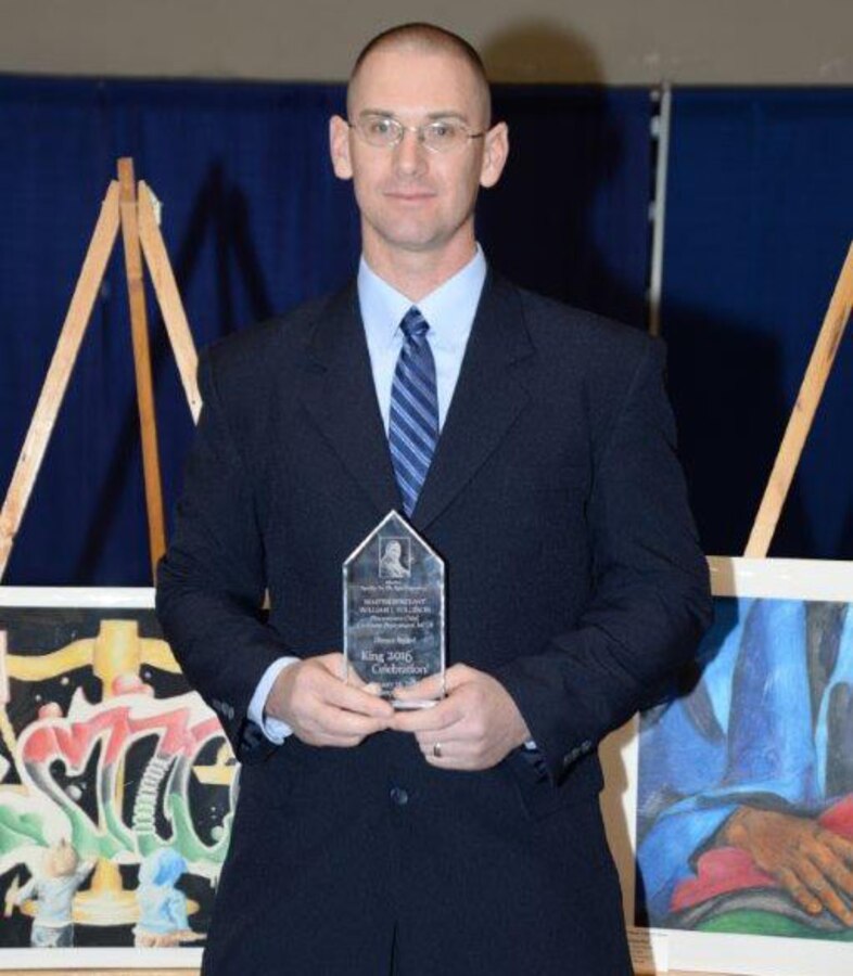 Master Sgt. William Tolleson, procurement chief, Contracts Department, Marine Corps Logistics Command, receives the 2016 Dr. Martin Luther King, Jr., Dream Award at the Albany James H. Gray Sr. Civic Center for the 21st annual King Day Celebration to pay tribute to the life and legacy of Dr. Martin Luther King, Jr., noted civil rights leader, Jan. 19.