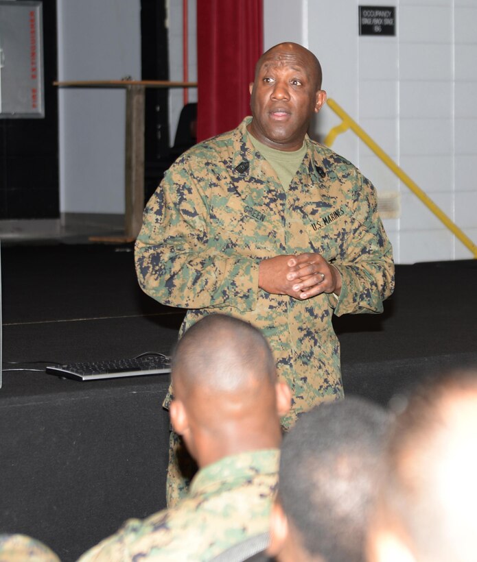 Sgt. Maj. Robert Green, sergeant major of the Marine Corps, addresses Marines and Sailors during his first visit to Marine Corps Logistics Base Albany. Green, the 18th SMMC, spoke to the installation’s active-duty service members in a Town Hall Meeting held at the Base Theater, Jan. 21.