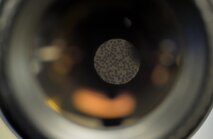 A blood smear sample is shown at 50x magnification through the oculus of a microscope at Barksdale Air Force Base, La., Jan. 26, 2016. Laboratory technicians added dye to blood cells to make samples more visible under microscopes. (U.S. Air Force photo/Airman 1st Class Mozer O. Da Cunha)