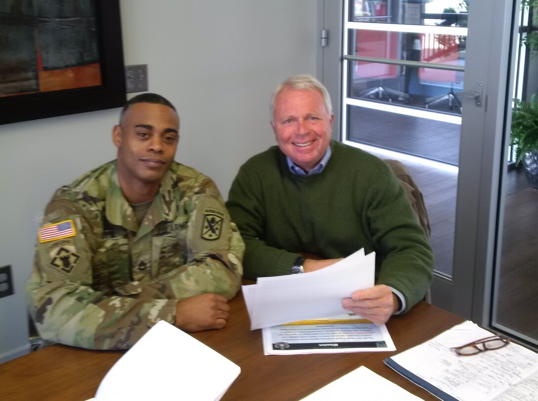 Military Planner Pete Gitto, from USACE Pacific Ocean Division, and Sgt. 1st Class Kenneth Davis, from the 95th Civil Affairs Brigade, partner at the planning workshop for a readiness exercise for the 97th Civil Affairs Battalion.  The team collaborated to integrate the USACE 62nd FEST into a civil affairs mission readiness exercise. (Courtesy photo by 95th Civil Affairs Brigade)