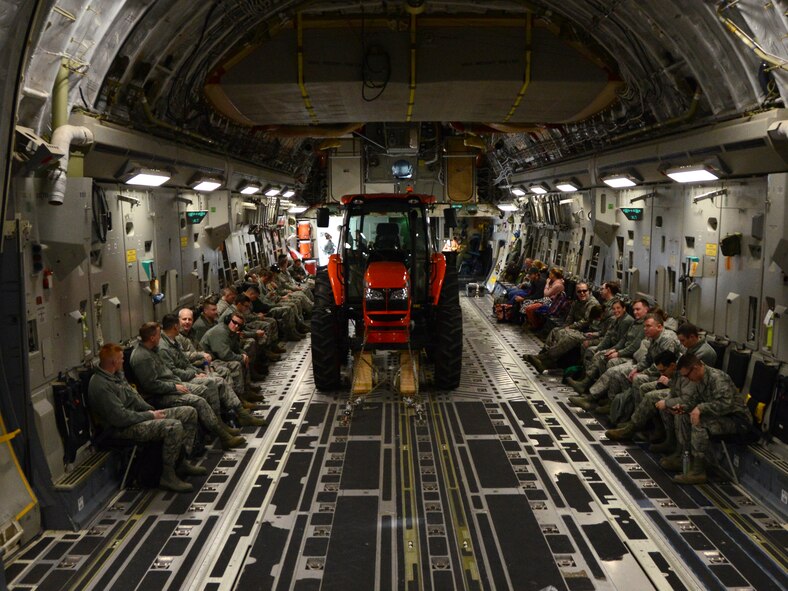 Members of the 30th Aerial Port Squadron prepare to depart for Dobbins Air Reserve Base, G.A., on January 9, 2016 at the Niagara Falls Air Reserve Station. The NFARS members will be performing a training exercise there. (Photo by U.S. Air Force Staff Sgt. Richard Mekkri)