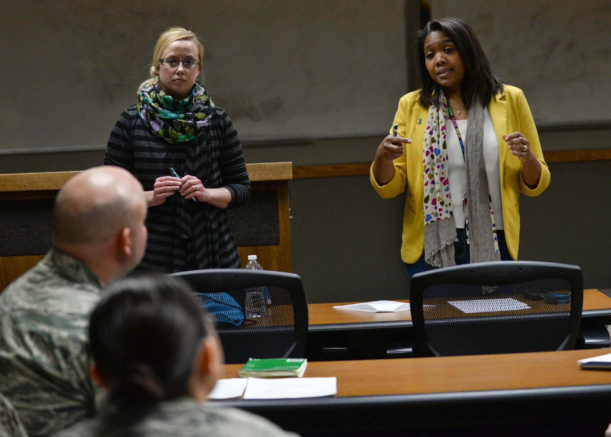 Eunice “Bernie” McFarling, 28th Bomb Wing sexual assault response coordinator, and Krista Sheridan, 28th BW full-time sexual assault victim advocate, facilitates sexual assault awareness and prevention month planning meeting at Ellsworth Air Force Base, S.D., Jan. 15, 2015. According to McFarling, education and awareness are pertinent to helping prevent sexual assault in the military and are also pivotal to nurturing a safe environment. (U.S. Air Force photo by Senior Airman Anania Tekurio/Released)