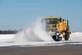 An 11th Civil Engineer Squadron snow removal vehicle plows snow on the Joint Base Andrews, Md. flightline, Jan. 24, 2016. The 11th CES snow removal team works nonstop from the first snowfall until the flightline is cleared. (U.S. Air Force photo by Senior Airman Dylan Nuckolls/Released)
