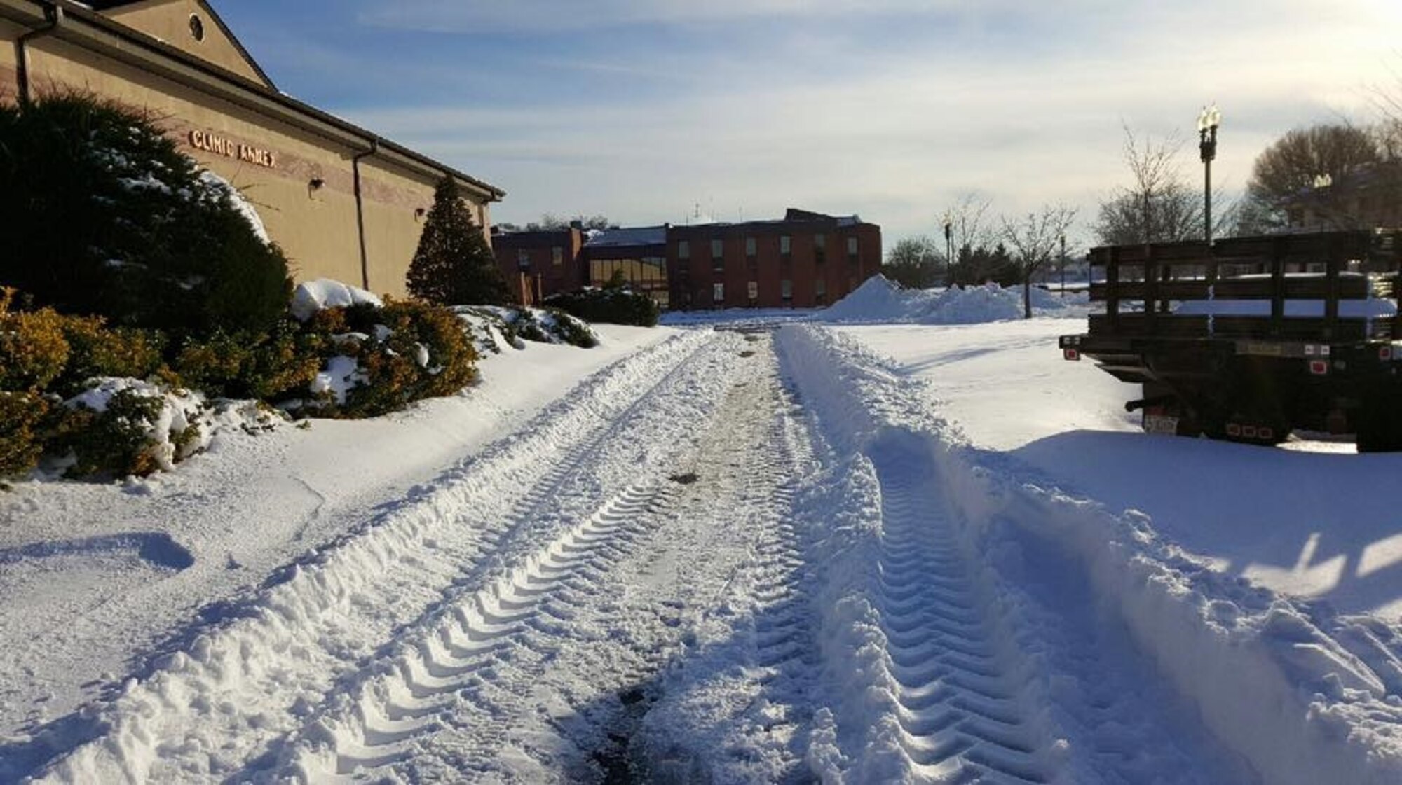 The 579th Medical Group on Joint Base Anacostia-Bolling started cleaning up from the Blizzard of 2016. Thanks to the teams that worked to clean up the snow so patients and staff could make it safely to the clinic. (US Air Force Photo by Tech. Sgt. Matthew Shaffer)