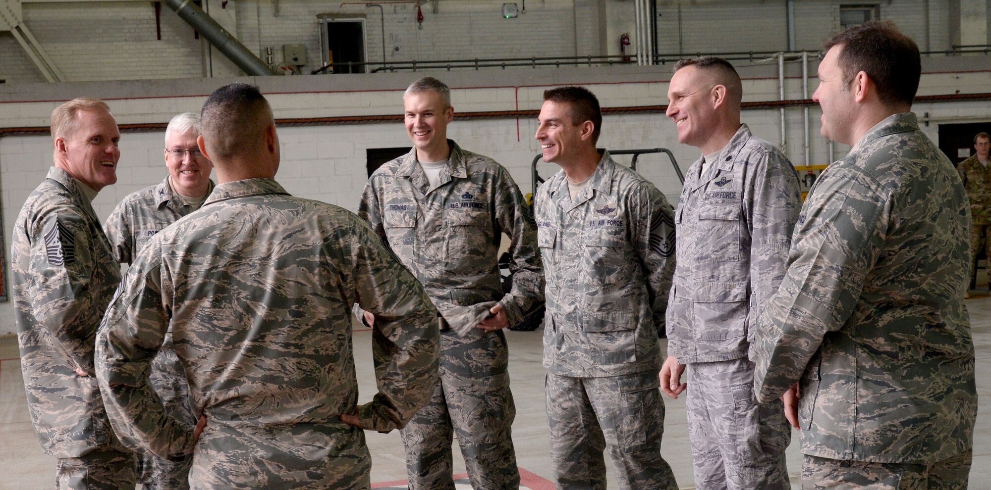Chief Master Sgt. of the Air Force James Cody meets with leadership from the 352nd Special Operations Wing Jan. 27, 2016, on RAF Mildenhall, England. Leadership led Cody through their units to meet with Airmen and learn about their mission. (U.S. Air Force photo by Airman 1st Class Justine Rho/Released) 