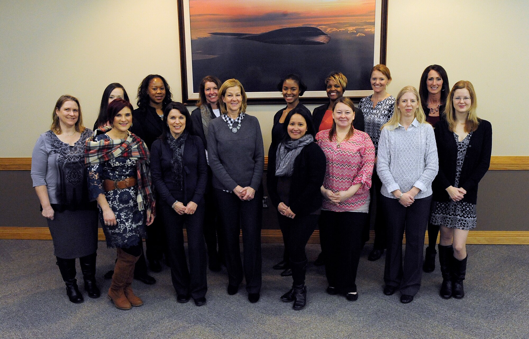 Members from the Whiteman Key Spouse program stand with Kim Rand, left-center, wife of AFGSC commander Gen. Robin Rand, at Whiteman Air Force Base, Mo., Jan. 20, 2016. During a meeting with Mrs. Rand, key spouses discussed how the program engages with family members and their goals for the program. (U.S. Air Force photo by Airman 1st Class Jazmin Smith)