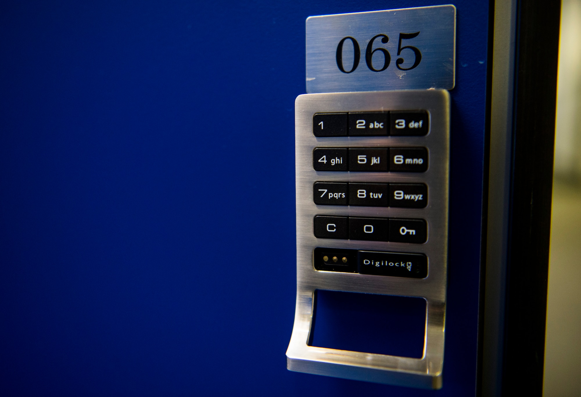A new keypad lock system displays itself on the outside of a locker door at the Powerhaus Fitness Center on Spangdahlem Air Base, Germany, Jan. 27, 2016. The 52nd Force Support Squadron recently installed keypad lock systems to locker doors at the fitness center. (U.S. Air Force photo by Airman 1st Class Luke Kitterman/Released)  