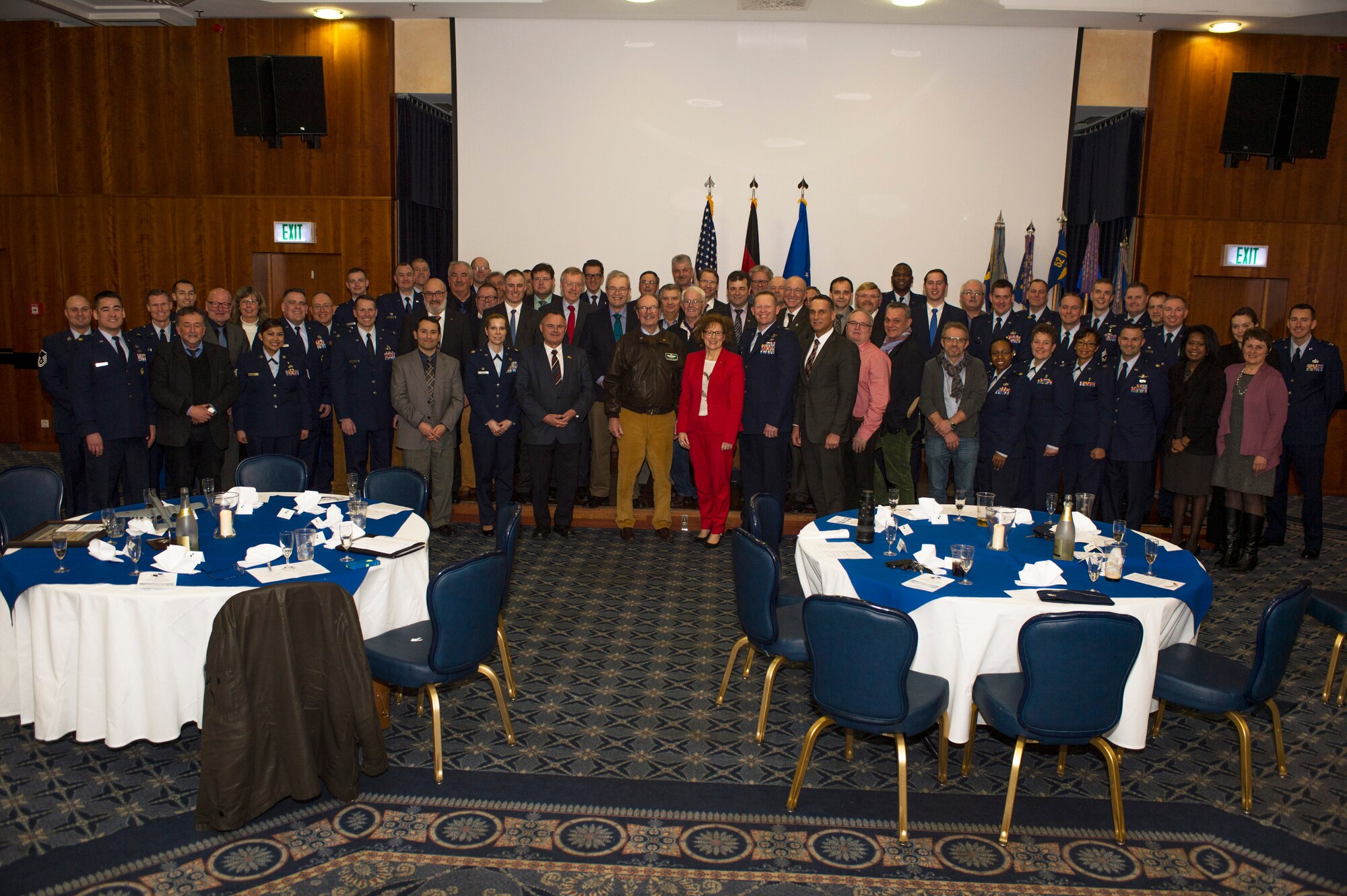 Commanders and honorary commanders of the 52nd Fighter Wing pose for a group photo at the conclusion of the Honorary Commander's Program graduation ceremony at Club Eifel on Spangdahlem Air Base, Germany, Jan. 22, 2016. The honorary commander's program aims to forge strong friendships between the air base and the host nation communities. (U.S. Air Force photo by Staff Sgt. Joe W. McFadden/Released)