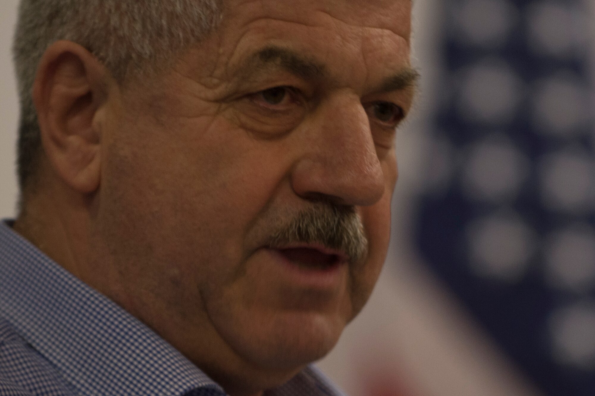 Klaus Rodens, mayor of Spangdahlem and honorary commander of the 52nd Fighter Wing, speaks during the Honorary Commander's Program graduation ceremony at Club Eifel on Spangdahlem Air Base, Germany, Jan. 22, 2016. Rodens spoke about the continuing partnership between the U.S. Air Force and the host nation community in his city. (U.S. Air Force photo by Staff Sgt. Joe W. McFadden/Released)