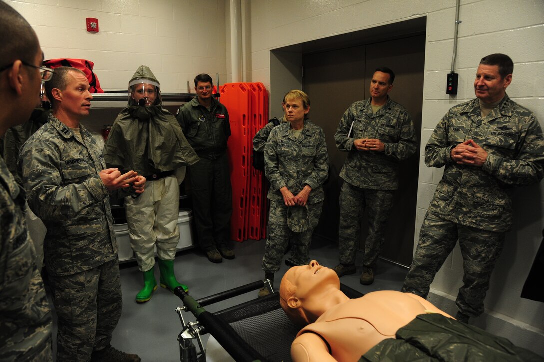 Capt. Jesse Hemsworth, a 509th Medical Operations Squadron physician’s assistant, explains decontamination procedures to Gen. Robin Rand, AFGSC commander, at Whiteman Air Force Base, Mo., Jan. 20, 2016. In addition to visiting the 509th Medical Group, Rand visited different facilities and learned about their missions as well as future base innovations. (U.S. Air Force photo by Senior Airman Keenan Berry/Released)