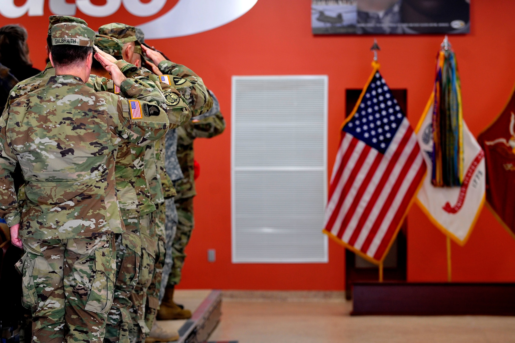 U.S. Army Col. William Galbraith, commander of the 733rd Mission Support Group, along with other senior leadership, salutes the American flag during a deployment ceremony at Fort Eustis, Va., Jan. 24, 2016. To show support, many family members and friends honored those who were departing to their deployed location. (U.S. Air Force photo by Senior Airman Breonna Veal)