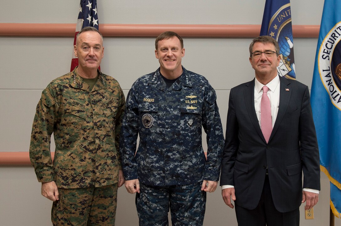 Defense Secretary Ash Carter, right, poses for a photo with Marine Corps Gen. Joseph F. Dunford, left, chairman of the Joint Chiefs of Staff, and commander of U.S. Cyber Command, Navy Adm. Michael S. Rogers, as they meet at Cybercom headquarters on Fort George G. Meade, Md, Jan. 27, 2016. DoD photo by Air Force Senior Master Sgt. Adrian Cadiz