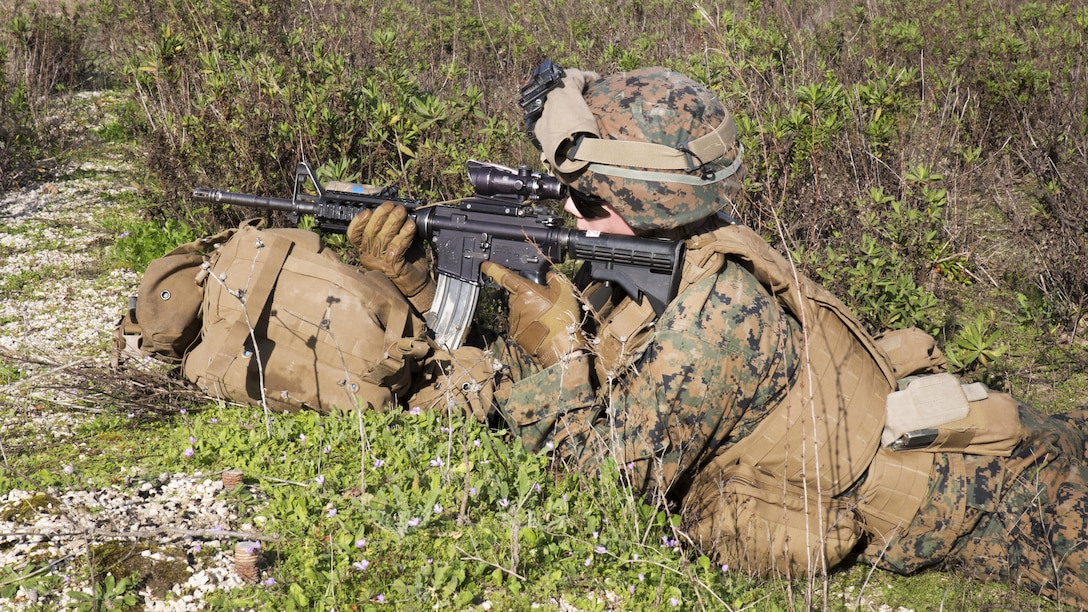 A U.S. Marine with Special-Purpose Marine Air-Ground Task Force Crisis Response-Africa provides security during quick-response training at Naval Station Rota, Spain, January 23, 2016. The alert force tested the unit’s capabilities by simulating the procedures of reacting to a time-constrained, crisis-response mission.