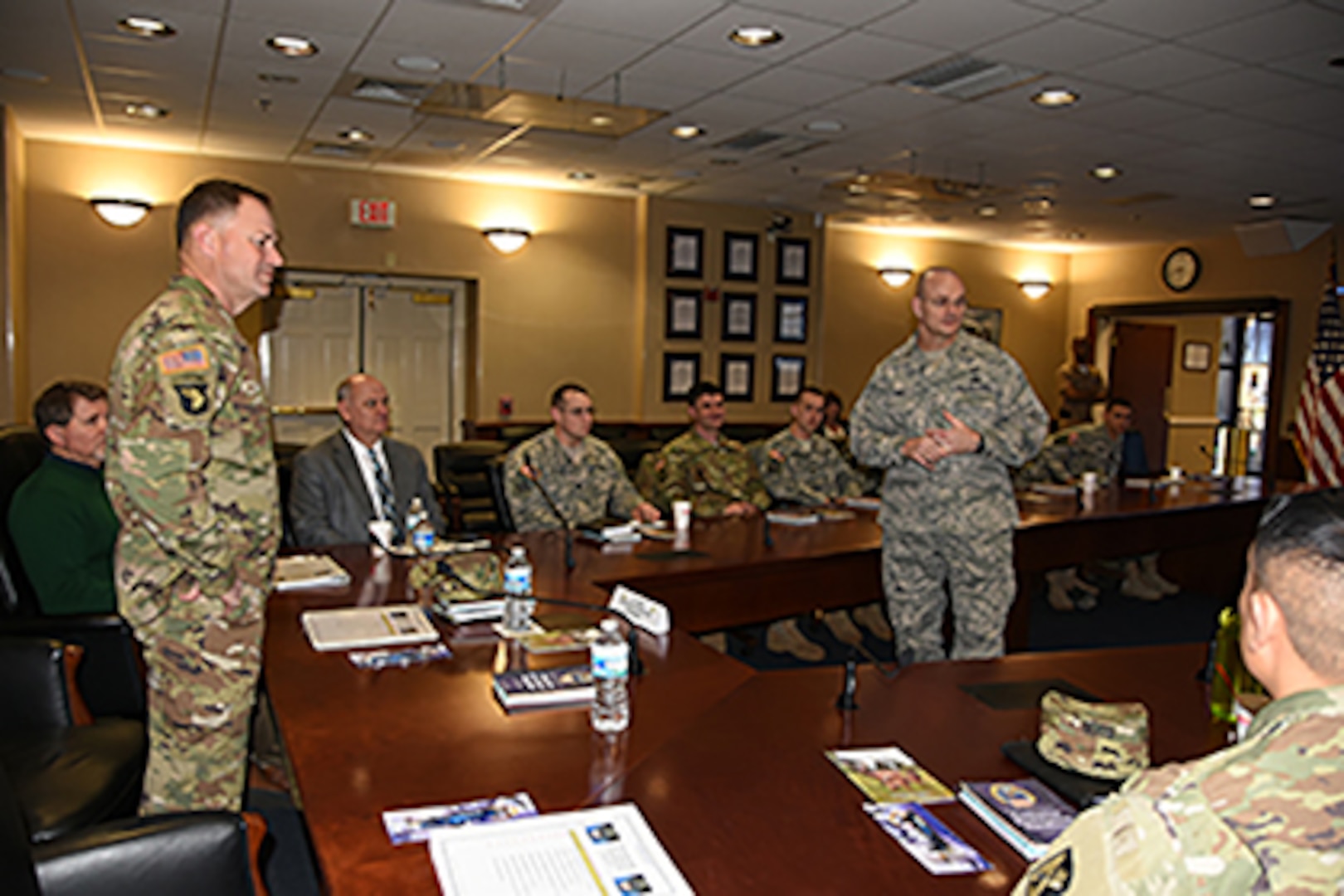 DLA Aviation at Richmond hosts a leadership professional development event for the 128th Aviation Brigade from Fort Eustis, Virginia Jan. 21, 2016.DLA Aviation Commander Allan Day, standing center, and 128th Aviation Brigade Commander Army Col. John Smith, standing left, facilitate discussions on demand chain processes in acquiring parts. 