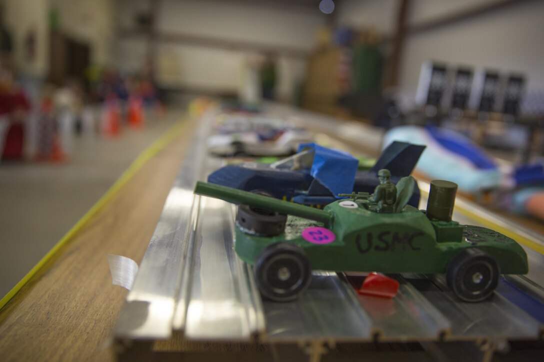 Pinewood Derby racecars are displayed after the annual Cub Scout Pinewood Derby at the Armed Services YMCA aboard the Combat Center, Jan. 23, 2016. (Official Marine Corps photo by Lance Cpl. Levi Schultz/Released)