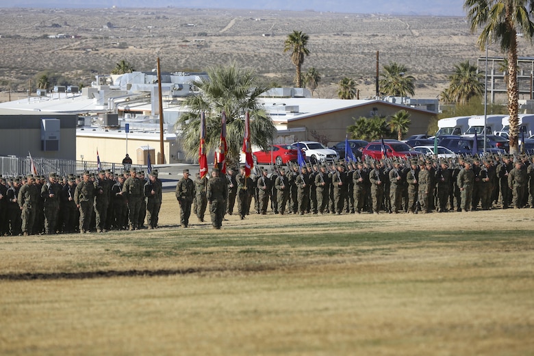 Marines and sailors of 7th Marine Regiment stand in formation during the 7th Marine Regiment change of command ceremony at Lance Cpl. Torrey L. Gray Field, Dec. 18, 2015. (Official Marine Corps photo by Cpl. Medina Ayala-Lo/Released)