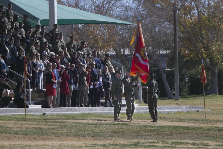 Col. William H. Vivian, commanding officer, 7th Marine Regiment, holds the Regimental Colors after receiving them from Col. Jay M. Bargeron, former commanding officer, 7th Marine Regiment, during the regiment’s change of command ceremony at Lance Cpl. Torrey L. Gray Field, Dec. 18, 2015. (Official Marine Corps photo by lance Cpl. Thomas Mudd/Released)