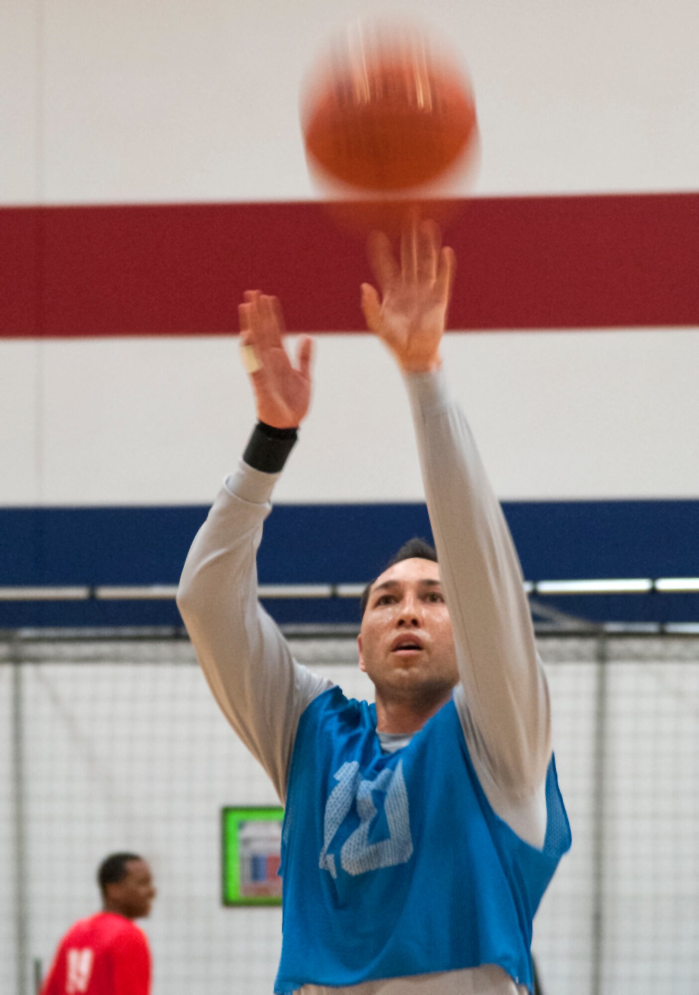 David Rivera, 90th Force Support Squadron, takes a free throw shot during an intramural basketball game Jan. 26, 2016, on F.E. Warren Air Force Base, Wyo. Rivera made the shot. (U.S. Air Force photo by Senior Airman Jason Wiese)