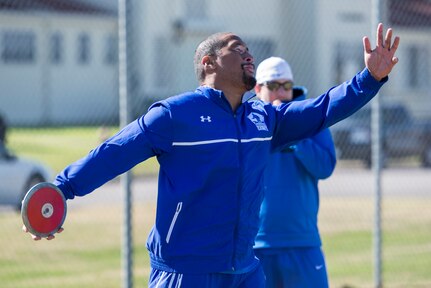 Retired Staff Sgt. Tino Uli throws a discus Jan. 22, 2016, during the South Central Regional Warrior Caregiver, Adaptive and Rehabilitative Sports, Recovering Airmen Mentorship Program, and Employment and Career Services Event. Warriors engage in adaptive and rehabilitative sports, discover ways to achieve employment and career readiness goals, and receive training on how to become mentors.