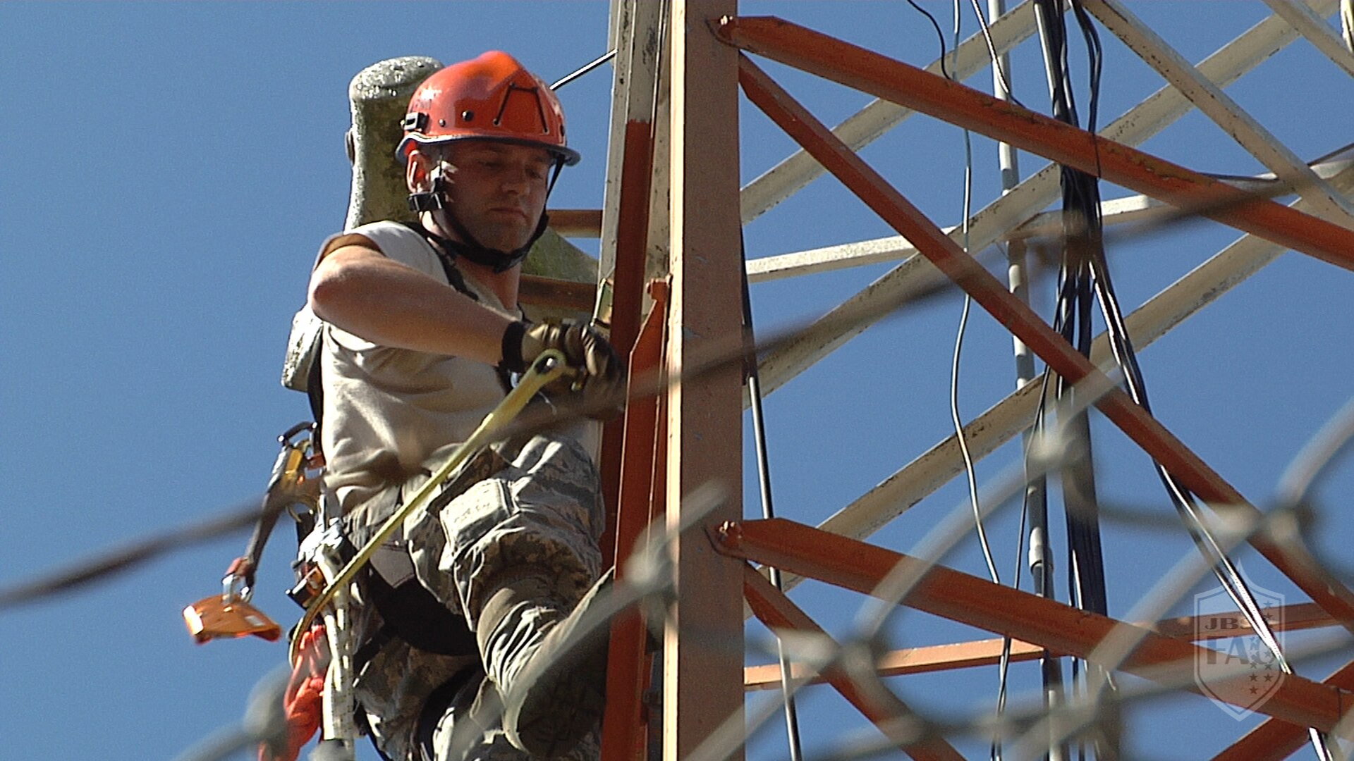 Staff Sgt. Adam Nichols, 502nd Communications Squadron cable and antenna systems craftsman, climbs an antenna Sept. 14, 2015, at Joint Base San Antonio-Fort Sam Houston. 502nd CS members serve more than 40,000 joint military and civilian customers in more than 600 buildings at JBSA.