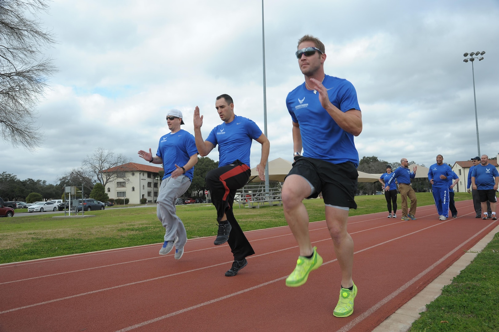 From left, Mitchell Kieffer, 1st Sgt. Estevan Vigil, and Chris Fugitt participates in the Wounded Warriors sports camp, at Joint Base San Antonio-Randolph, Jan. 19, 2016. The camp, offered by the Air Force Wounded Warrior Program, featured a variety of physical activities: air rifle, air pistol and archery; cycling; sitting volleyball; swimming; wheelchair basketball and yoga.  (U.S. Air Force photo by Joel Martinez/Released)