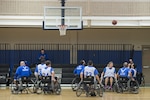 Wounded Warriors play wheelchair basketball Jan. 22, 2016, during the South Central Regional Warrior Caregiver, Adaptive and Rehabilitative Sports, Recovering Airmen Mentorship Program, and Employment and Career Services Event. Warriors engage in adaptive and rehabilitative sports, discover ways to achieve employment and career readiness goals, and receive training on how to become mentors.