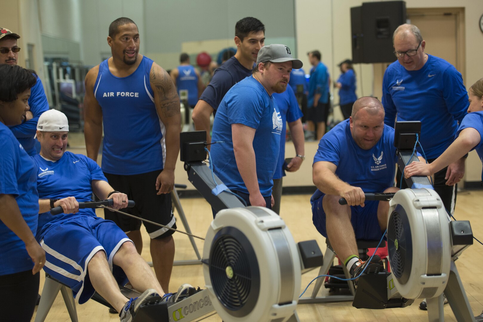 Retired Senior Airman Chris Fugitt and retired Master Sgt. Craig Zaleski row during a 1,000-meter relay race Jan. 22, 2016, during the South Central Regional Warrior Caregiver, Adaptive and Rehabilitative Sports, Recovering Airmen Mentorship Program, and Employment and Career Services Event. Warriors engage in adaptive and rehabilitative sports, discover ways to achieve employment and career readiness goals, and receive training on how to become mentors.