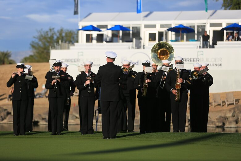 Navy Band Southwest plays renditions of patriotic music during the Career Builder Challenge Military Appreciation Ceremony at the Tom Weiskopf Private Course located in the Professional Golfers Association of America Course West in La Quinta, Calif., Jan. 23, 2016. (Official Marine Corps photo by Cpl. Julio McGraw/Released)