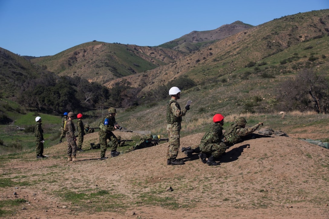 Japan Ground Self-Defense Force soldiers rehearse for a platoon attack exercise aboard Marine Corps Base Camp Pendleton, Calif., Jan. 25, 2016. Marines with 1st Battalion, 4th Marine Regiment facilitated the use of the range, both allowing the JGSDF soldiers to practice their skills in an unfamiliar training environment, and share tactics and skills with their U.S. counterparts.
