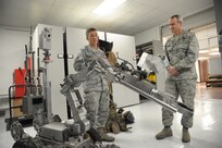 Staff Sgt. Bryan Woiewucki, 502nd Civil Engineering Squadron explosive ordnance disposal specialist, briefs Lt. Gen. Darryl Roberson, Commander of Air Education and Training Command, on the equipment EOD employs Jan. 21, Joint Base San Antonio-Lackland.  Roberson was provided a 502nd Air Base Wing immersion tour where he visited units throughout JBSA-Randolph, Lackland and Fort Sam Houston, Jan. 20-22.  The 502nd ABW is responsible for installation support across all JBSA locations.  (U.S. Air Force photo by Joel Martinez)