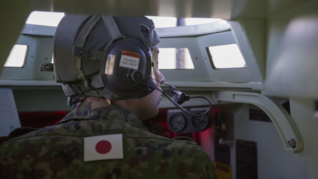 A soldier with the Japan Ground Self-Defense Force’s Western Army Infantry Regiment looks out from the driver’s seat of an amphibious assault vehicle onto a simulated battlefield during training during Exercise Iron Fist 2016 at Marine Corps Base Camp Pendleton, California, Jan. 26. Iron Fist is an annual, bilateral amphibious training exercise designed to improve U.S. Marine Corps and JGSDF’s ability to plan, communicate and conduct combined amphibious operations. The exercise provides valuable training to warriors from different cultures, and the opportunity to build camaraderie between the U.S. and Japanese militaries.