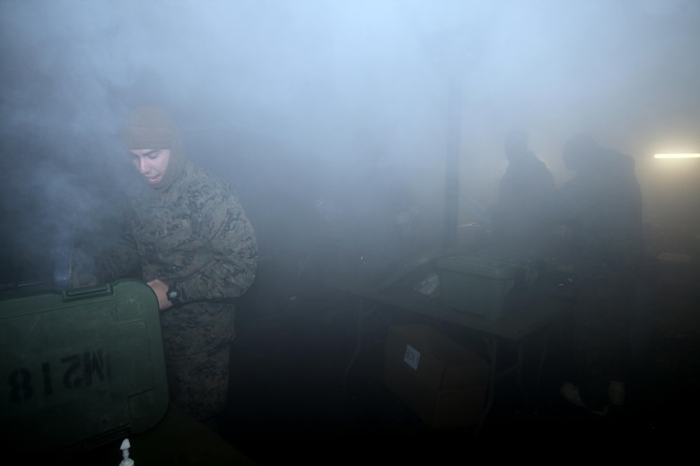 Food service specialist Marines prepare hot chow for Marines during cold weather training at the Marine Corps Mountain Warfare Training Center, Calif., Jan. 10, 2015. Hundreds of Marines participated in the cold weather training, enduring freezing temperatures during the two-week-long exercise in the Sierra Mountains. (U.S. Marine Corps photo by Cpl. Jason Jimenez/Released)