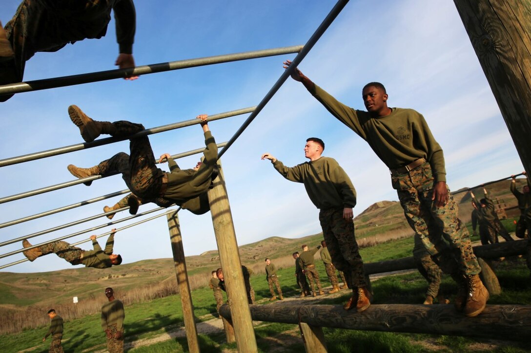 Marines race through the obstacle course during a Headquarters Battalion, 1st Marine Division Lance Corporal Leadership and Ethics Seminar combat conditioning session aboard Marine Corps Base Camp Pendleton, Calif., Jan. 27, 2016. The week-long seminar focuses on preparing lance corporals physically and mentally to become successful noncommissioned officers, while building the foundation for the more difficult residential courses like Corporals Course and Sergeants Course.