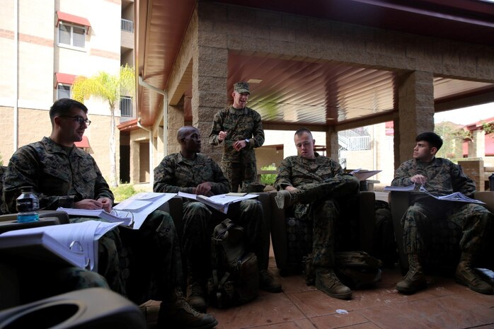 Staff Sgt. James Case, the chief instructor of the Headquarter Battalion, 1st Marine Division Lance Corporal Seminar Leadership and Ethics Seminar, teaches Marines about adapting to any given circumstance during a guided discussion, aboard Marine Corps Base Camp Pendleton, Calif., Jan. 27, 2016. Lance Corporal Leadership and Ethics Seminar recently became a mandatory requirement for junior Marines looking to become noncommissioned officers, and its resident curriculum supplements the previously required, online-only Leading Marines Marine Net course.