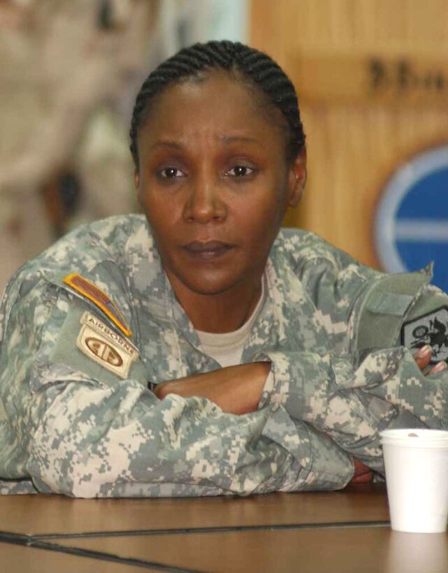 Sgt. Maj. Michele S. Jones listens attentively to Iraqi nationals report on female education. Jones is retiring as the ninth Soldier and first female to serve as the Army Reserve’s command sergeant major. 