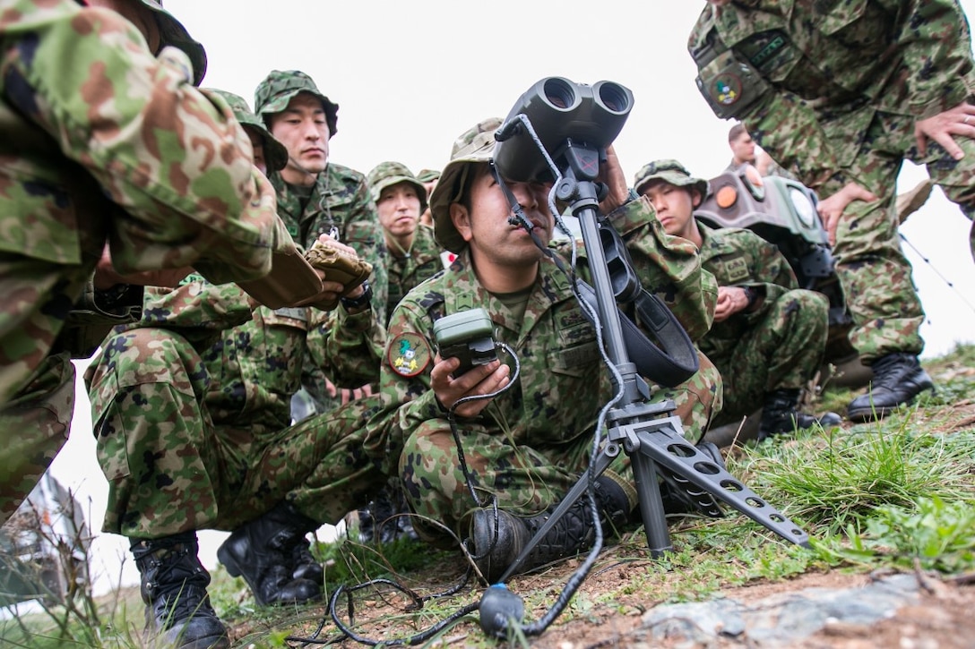 Japan Ground Self Defense Force (JGSDF) soldiers sight-in with vector binoculars while utilizing the defense advanced GPS receiver (DAGR) during Exercise Iron Fist 2016 aboard Camp Pendleton, Calif., Jan. 27. The DAGR is a dual frequency receiver used to specify location and transfer map data. (U.S. Marine Corps photo by Cpl. Xzavior T. McNeal/Released)