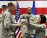 Col. Trevor Flint, 90th Maintenance Group commander, and Maj. Jacquie Sartori, 790th Maintenance Squadron commander, furl the recently inactivated 90th Maintenance Operations Squadron guidon Jan. 17, 2016, in the 90th MXG Maintenance High Bay on F.E. Warren Air Force Base, Wyo. The 90th MOS was redesignated to the 790th MXS. (U.S. Air Force photo by Senior Airman Jason Wiese)