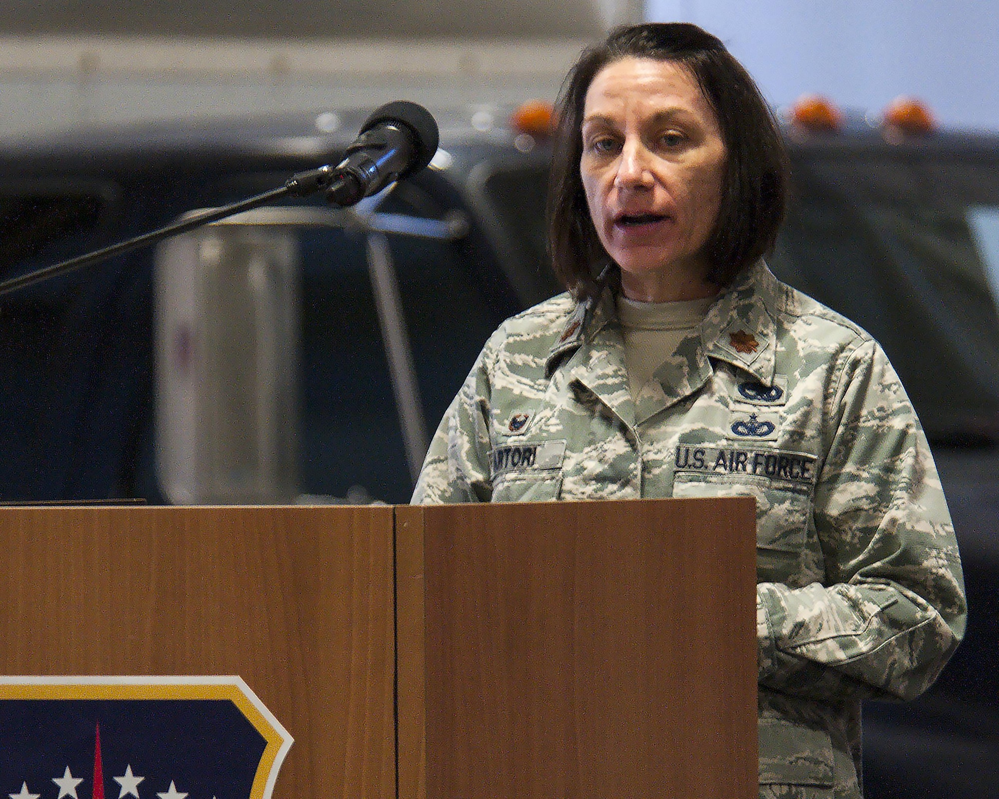 Maj. Jacquie Sartori, 790th Maintenance Squadron commander, speaks to the crowd at the 790th MXS redesignation ceremony Jan. 27, 2016, in the 90th Maintenance Group Maintenance High Bay on F.E. Warren Air Force Base, Wyo. Sartori became the first commander of the 790th MXS when the designation was created to replace the 90th Maintenance Operations Squadron — a change that brings the squadron in line with the naming conventions of maintenance squadrons throughout the Air Force. (U.S. Air Force photo by Senior Airman Jason Wiese)