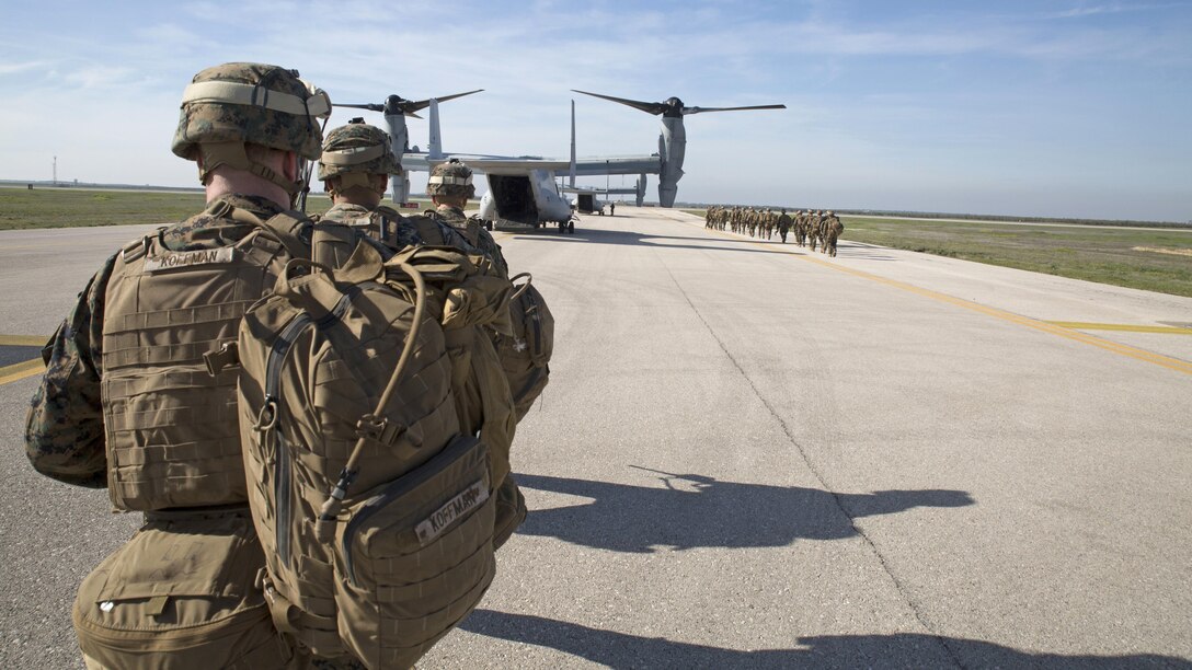 U.S. Marines with the Ground Combat Element, Special-Purpose Marine Air-Ground Task Force Crisis Response-Africa, prepare to board an MV-22B Osprey during an alert drill at Morón Air Base, Spain, Jan. 23, 2016. SPMAGTF-CR-AF’s crisis response capability requires Marines to be ready to respond within six hours of an alert in support of U.S. Africa Command.