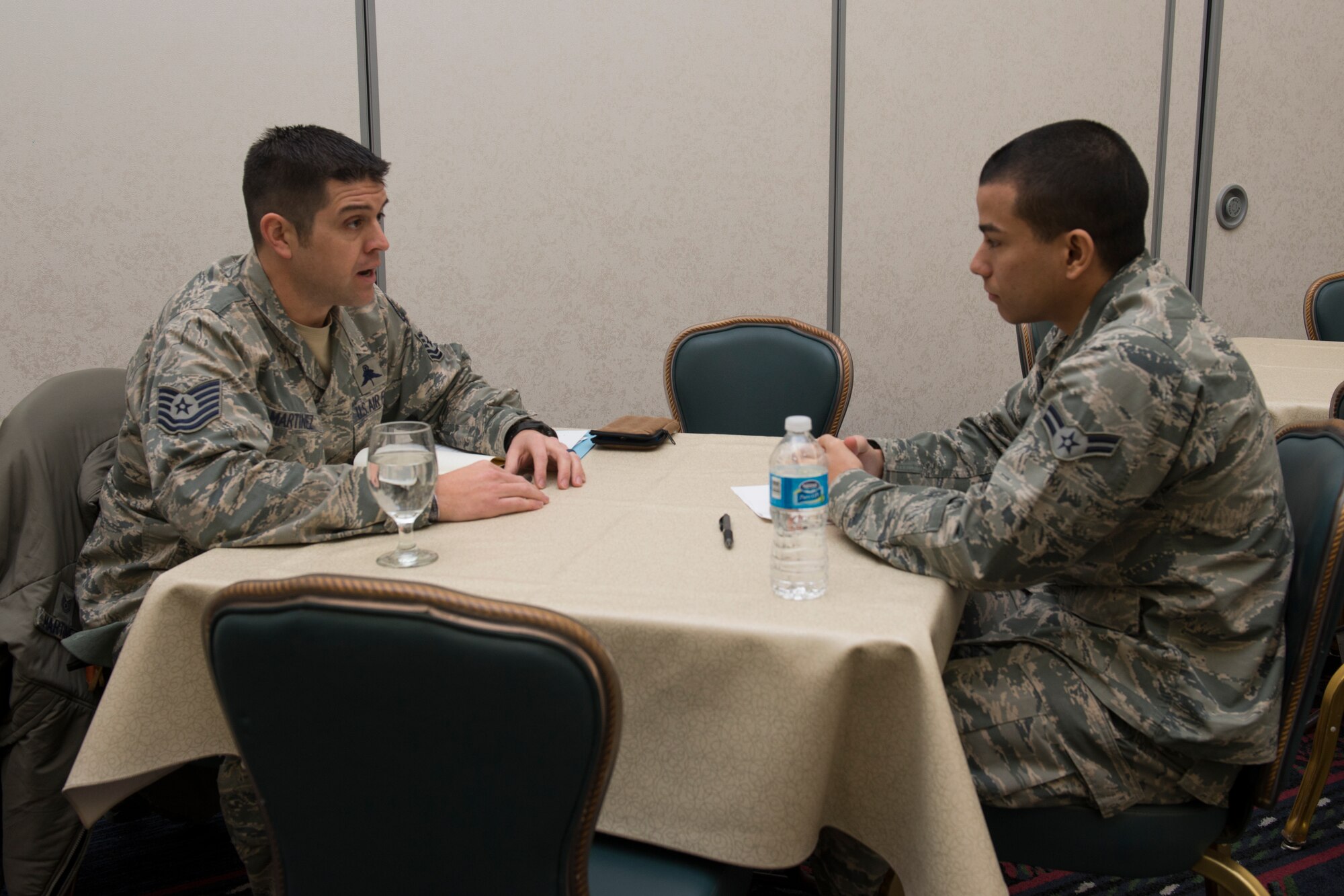 Tech. Sgt. Jason Martinez, Air Mobility Command command support, mentors an Airman during a speed mentoring event Real Talk, Real Quick, Jan. 22,2015, Scott Event Center, Scott Air Force Base Illinois. Approximately 20 mentors attended the speed mentoring event sponsored by the NCO council. (U.S. Air Force Photo by Airman 1st Class Melissa Estevez)